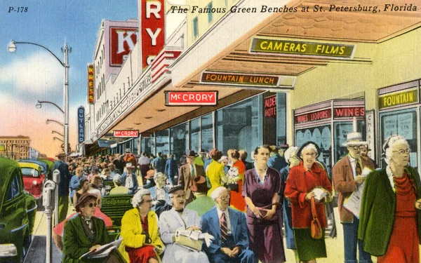 Vintage postcard of the famous green benches lining a downtown St. Petersburg street